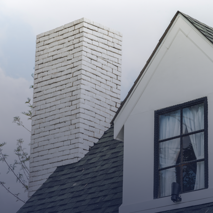 An exterior close-up of a home's chimney