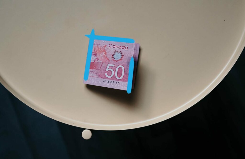 Fifty dollar canadian bill on a table