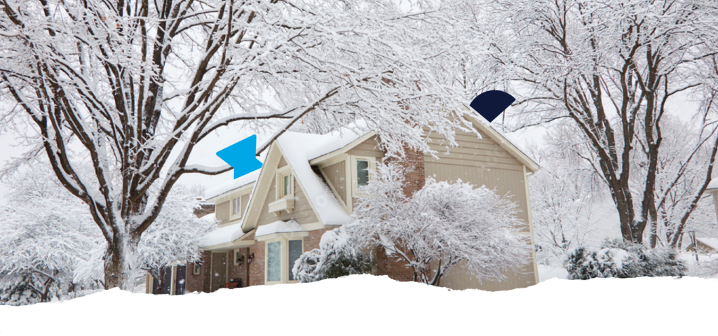 A large house covered in snow