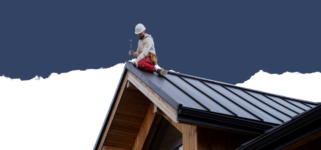 A person on a roof fixing it